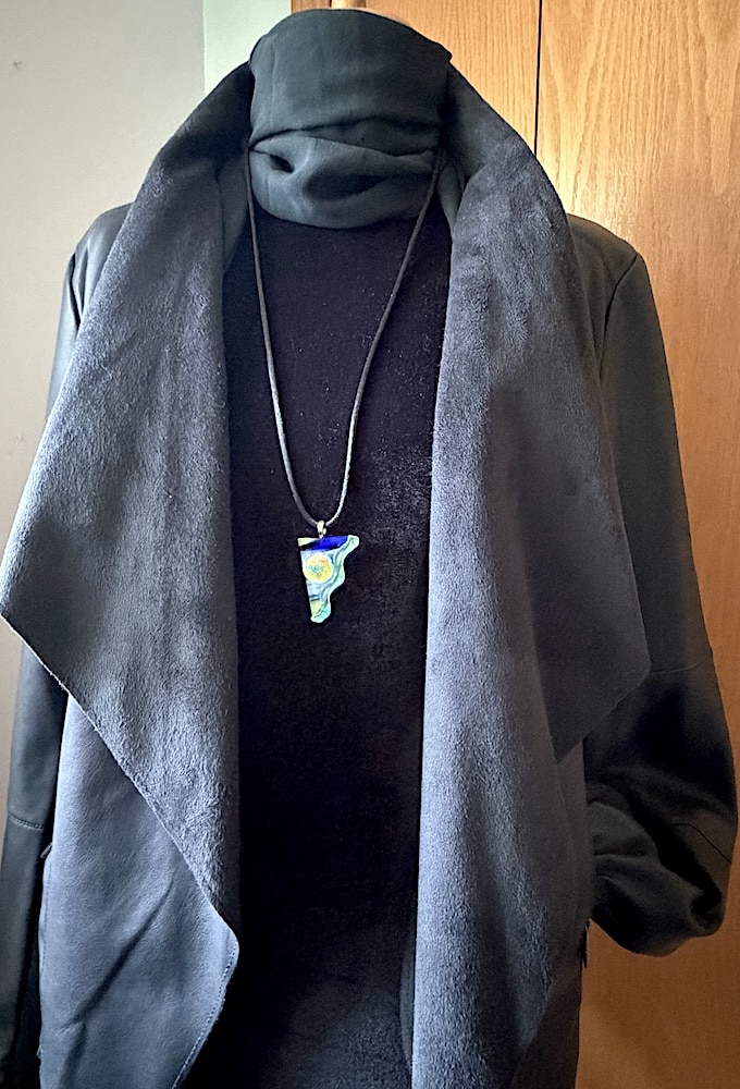 Wavy Dagger Dichroic Pendant on Black Blouse