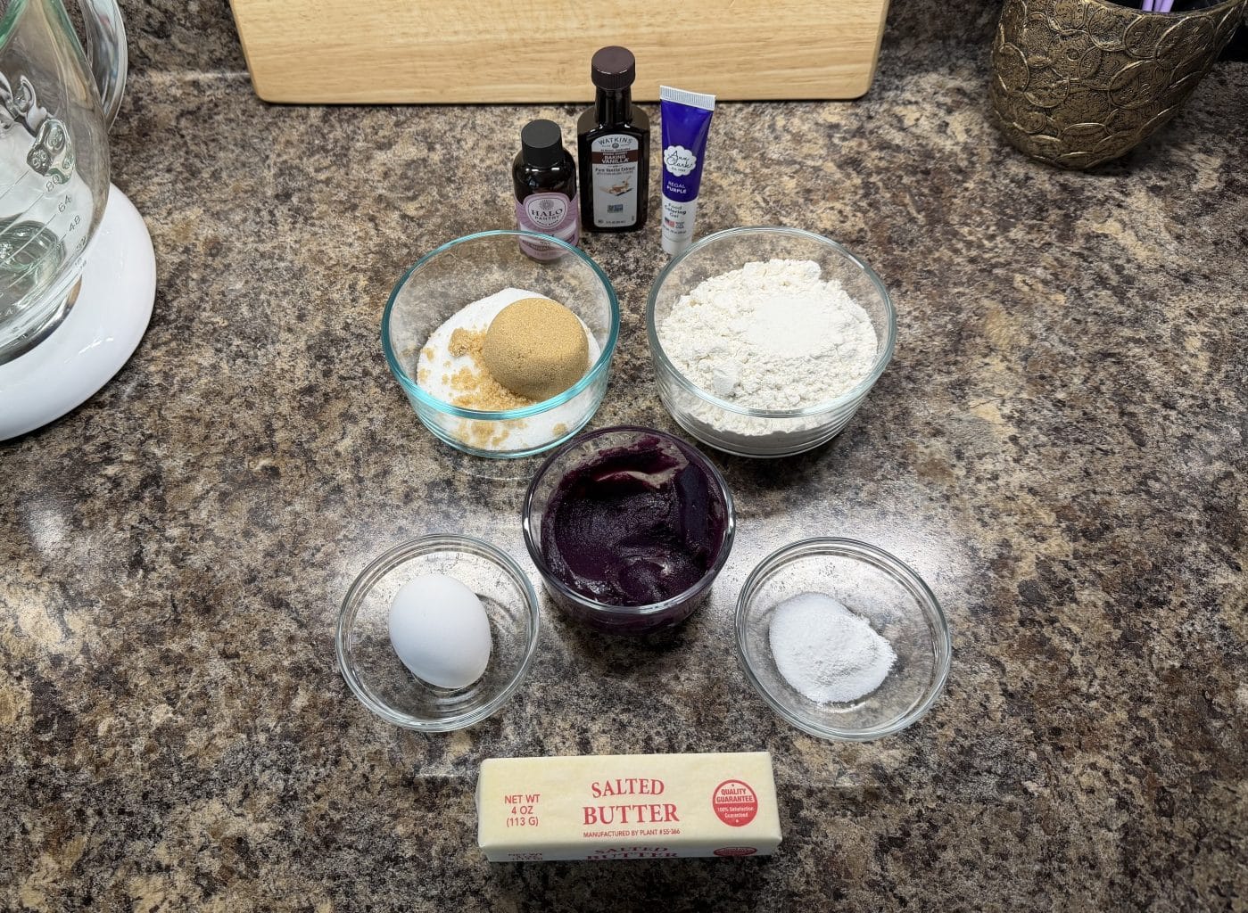 Ube Crinkle Cookie Ingredients on a brown counter