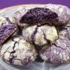Purple Ube Cookies on White Swirl Plate against a purple background