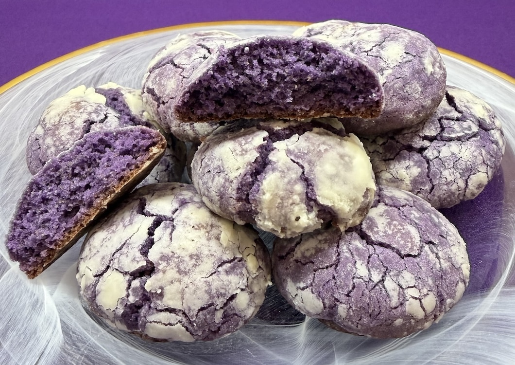 Purple Ube Cookies on White Swirl Plate against a purple background